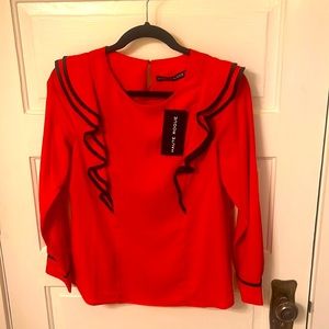 Haute Rogue red blouse